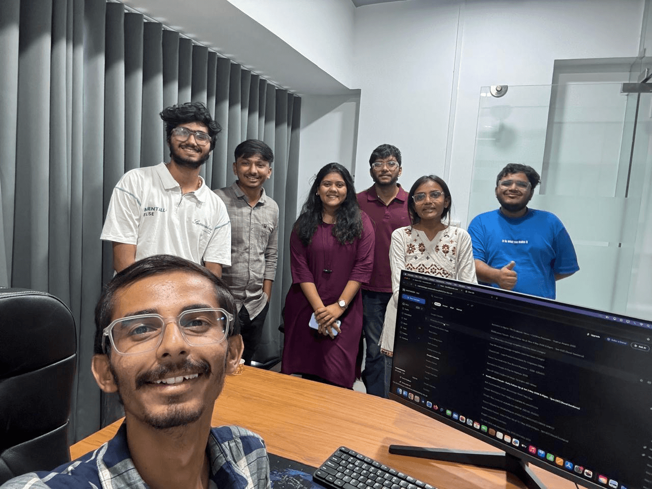 Candid team selfie in the meeting room